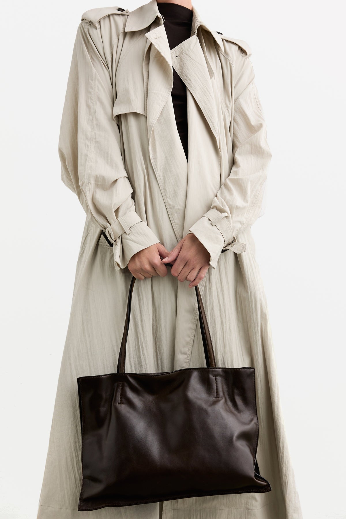 Yumi Sling Umber, worn by a model