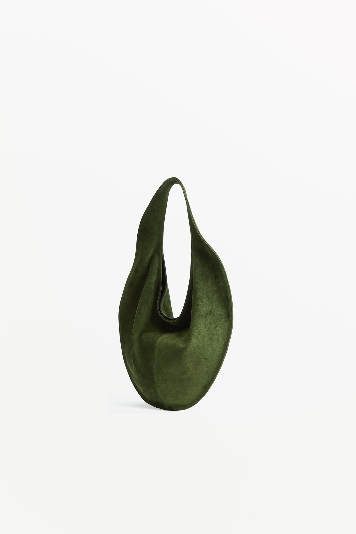 Market Tote Suede Matcha, worn on the shoulder