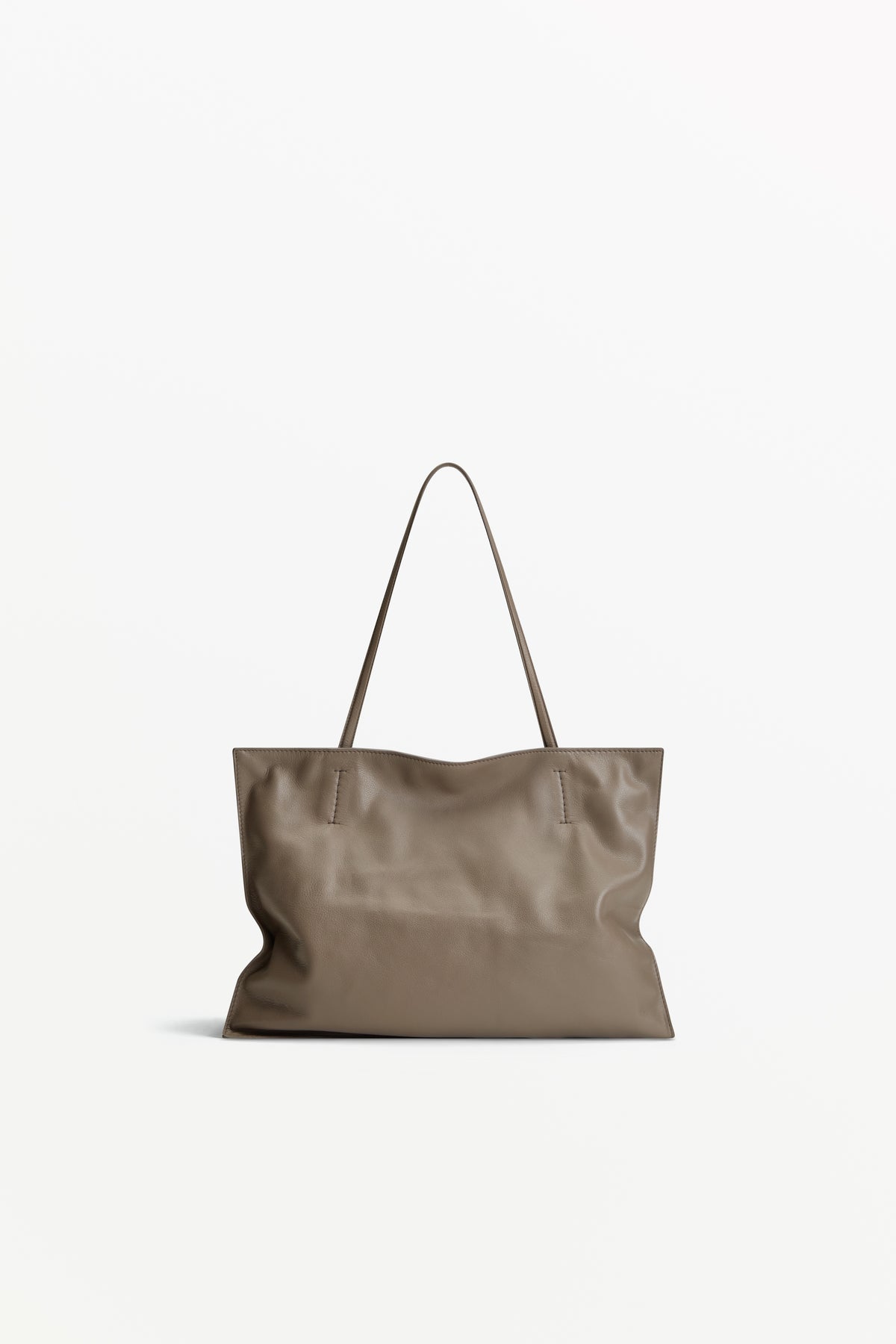 Yumi Sling Mute, worn on the shoulder