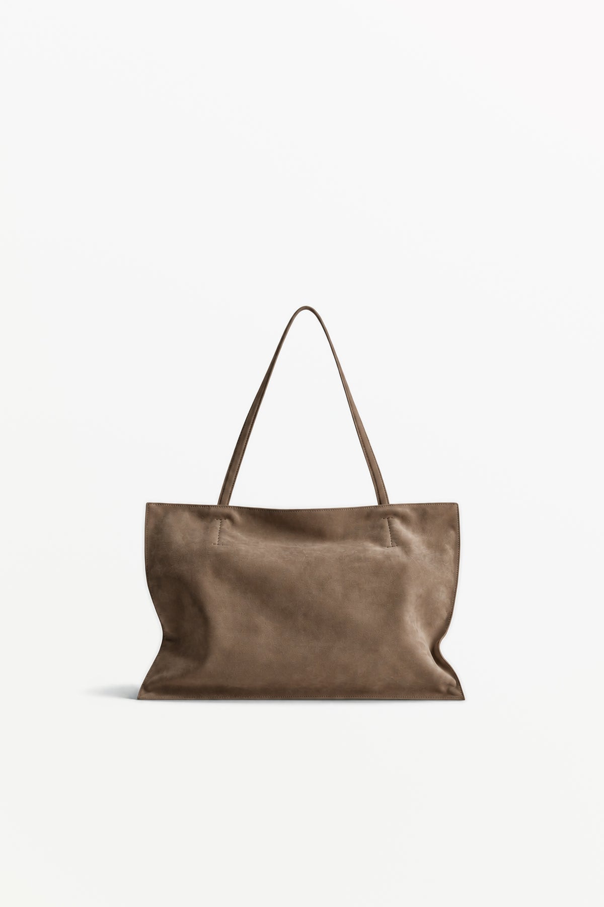 Yumi Sling Nubuck Contour, worn on the shoulder