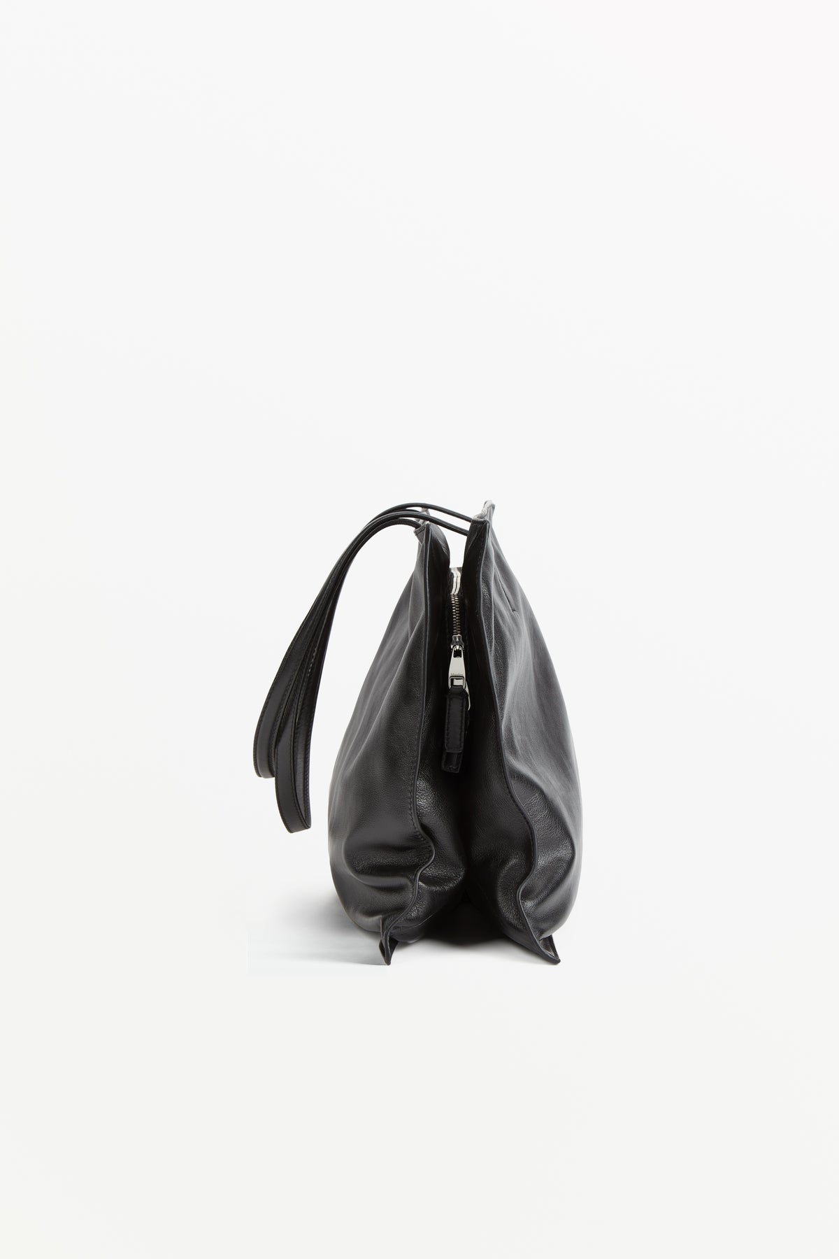 Yumi Sling Oil, profile view