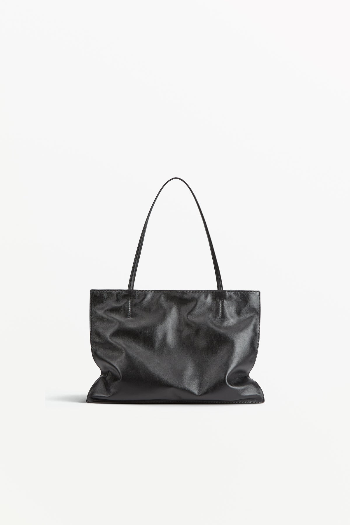 Yumi Sling Oil, worn on the shoulder