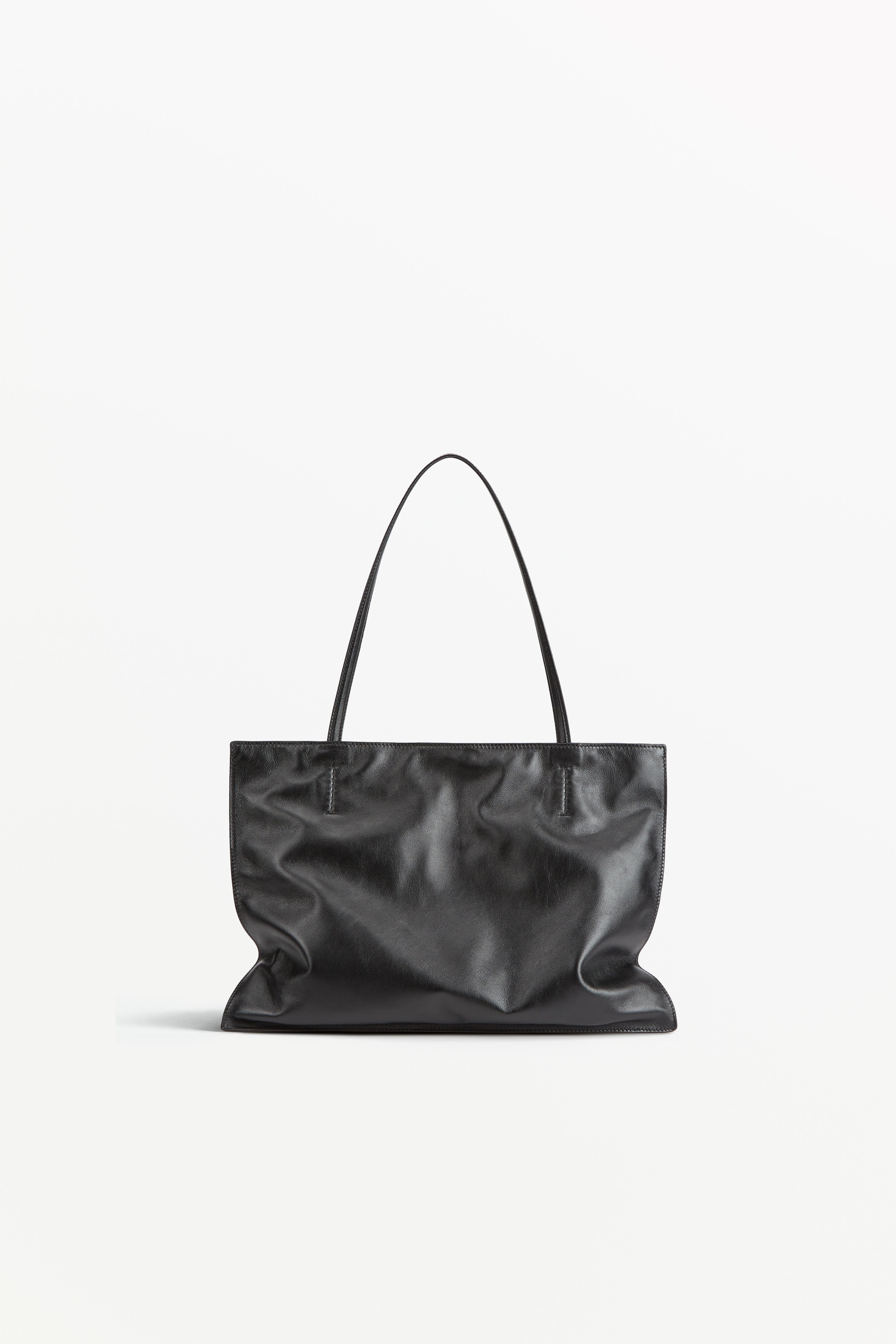 Yumi Sling Oil, worn on the shoulder